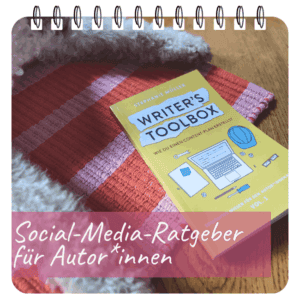 Der Schreibratgeber "Writer's Toolbox" von Stephanie Müller, zusammen mit dem Lektorenpudel